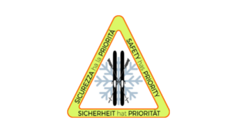 Sportgerätetechniker Warnschild mit Skiern und Schneeflocke Sicherheitspriorität in drei Sprachen