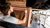 Home Mann mit Bart malt filigrane Muster an eine Wand mit Pinsel